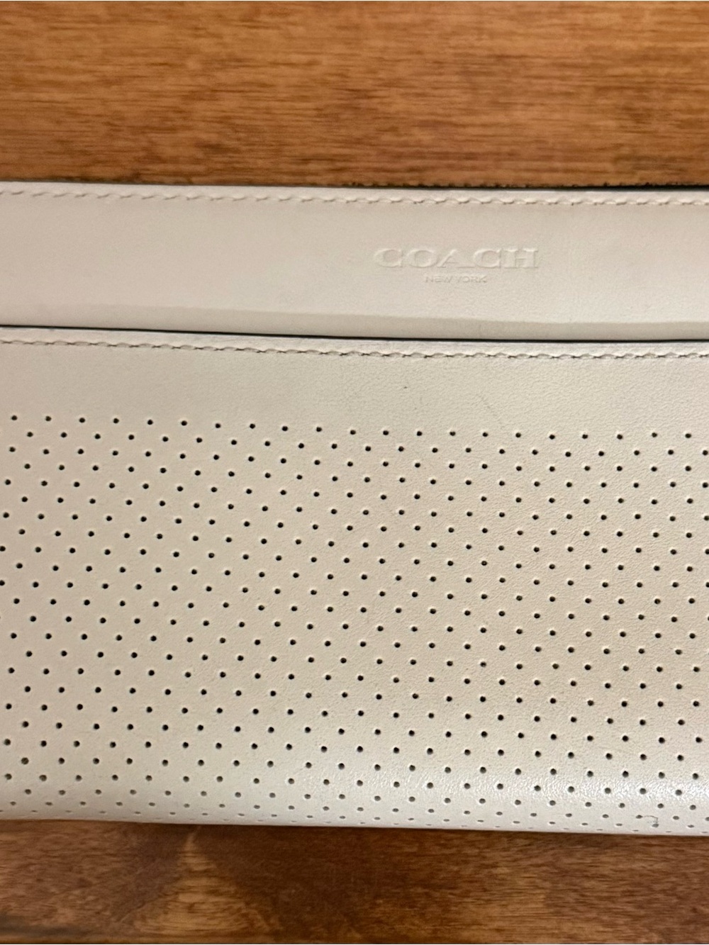 Coach Perforated Leather Clutch in Soft Ivory